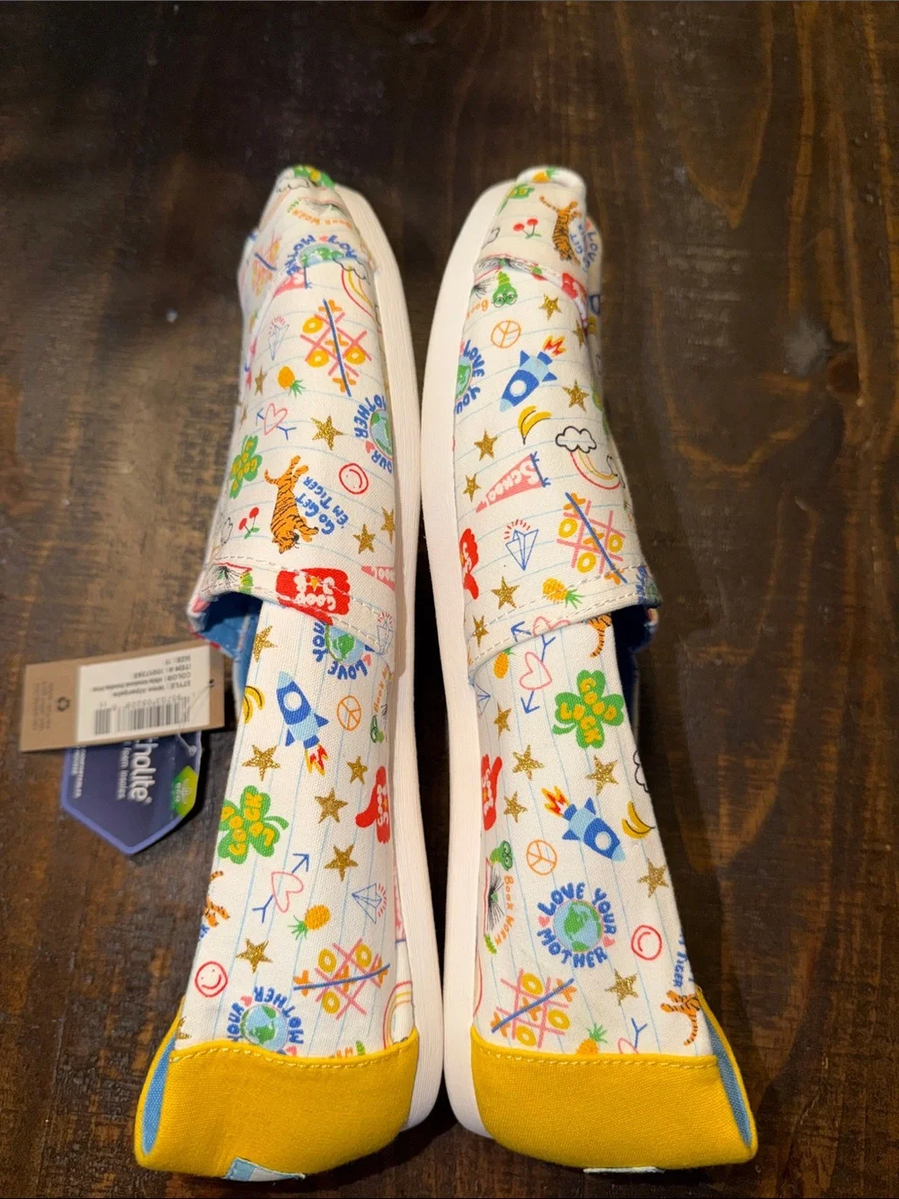 Toms Womens Printed Doodle Pad Canva Slip-Ons in White with Yellow and Blue